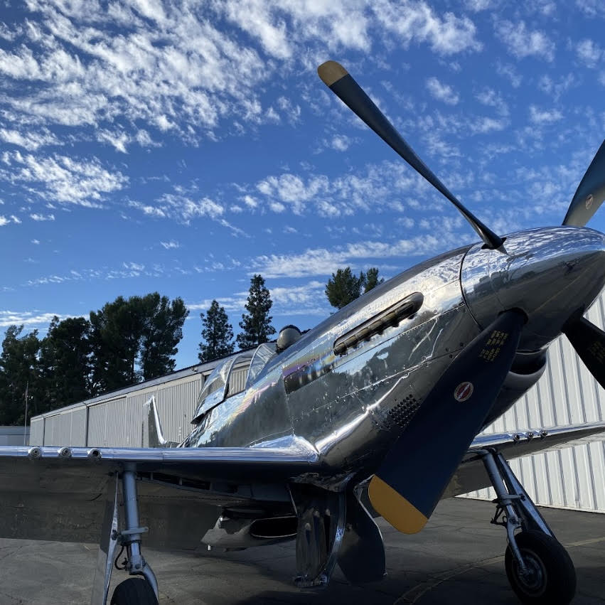 P-51 ride winner at a Warriors In Need event supporting veterans, veteran transition, and aviation-inspired opportunities.