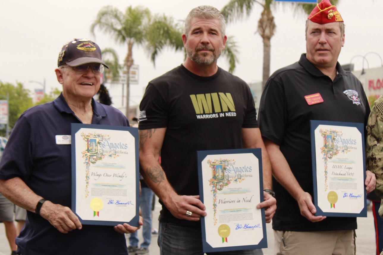 Canoga Park Memorial Day Parade featuring Warriors In Need support for veterans, veteran transition, and community recognition.